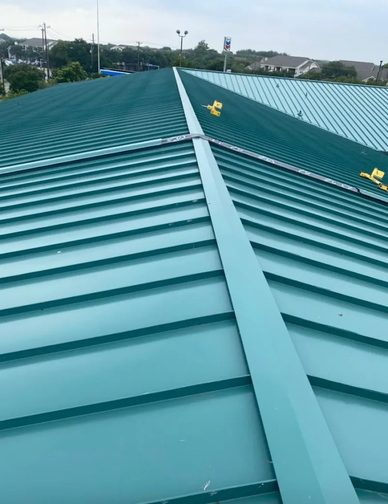 Green commercial metal roof ridge and valley for Metal Roof Repair in Bar Harbor